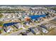 Aerial view showcases the home's location on a landscaped lot near community lakes and amenities at 163 Sago Palm Dr., Myrtle Beach, SC 29579
