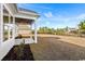 Inviting backyard featuring a covered patio, fenced area, and landscaping at 163 Sago Palm Dr., Myrtle Beach, SC 29579