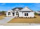 Picture of a lovely single Gathering home featuring a well-manicured front yard with fresh landscaping at 163 Sago Palm Dr., Myrtle Beach, SC 29579