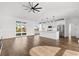 Bright open concept living room with kitchen and backyard access at 163 Sago Palm Dr., Myrtle Beach, SC 29579
