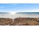 Relaxing ocean view from the condo featuring sand dunes leading to a pristine beach at 1709 S Ocean Blvd. S # 205, North Myrtle Beach, SC 29582