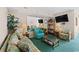 Inviting living room with a large mirror reflecting the dining area and comfortable furniture at 1709 S Ocean Blvd. S # 205, North Myrtle Beach, SC 29582