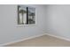 Bright bedroom with neutral walls, large windows, and tile flooring, creating a serene space at 1890 Colony Dr. # 17S, Myrtle Beach, SC 29575