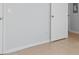 Neutral hallway with tile flooring, bright and clean with white door frames and baseboards at 1890 Colony Dr. # 17S, Myrtle Beach, SC 29575