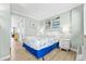 Charming bedroom with beach-themed decor, light walls, and tasteful bedside lamps at 2001 S Ocean Blvd. # 210, Myrtle Beach, SC 29577