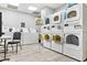 A convenient laundry room featuring multiple washers and dryers at 2001 S Ocean Blvd. # 210, Myrtle Beach, SC 29577