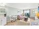 Inviting living room with bright decor, a beach view, and a dining table at 2001 S Ocean Blvd. # 210, Myrtle Beach, SC 29577