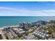 Sweeping aerial view capturing the beach, modern condos, and oceanfront community at 208 74Th Ave. N # 2517, Myrtle Beach, SC 29572