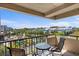 Balcony with outdoor seating offering scenic views of the water park and city skyline at 208 74Th Ave. N # 2517, Myrtle Beach, SC 29572