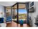 Living room with a balcony showcasing outdoor seating, a view of the city, and beautiful bright lighting at 208 74Th Ave. N # 2517, Myrtle Beach, SC 29572