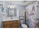 This cozy bathroom features a vanity, toilet, shower with decorative curtain, and neutral accents for a clean, comfortable space at 208 74Th Ave. N # 2517, Myrtle Beach, SC 29572