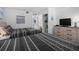Comfortable bedroom featuring two beds, a TV, and ample storage, designed for a relaxing stay at 208 74Th Ave. N # 2517, Myrtle Beach, SC 29572