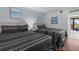 Inviting bedroom showcasing two beds with coastal decor and a balcony view, perfect for a restful vacation at 208 74Th Ave. N # 2517, Myrtle Beach, SC 29572