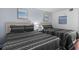 This serene bedroom features two beds with stylish patterned bedding and soft lighting, creating a relaxing retreat at 208 74Th Ave. N # 2517, Myrtle Beach, SC 29572