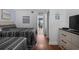 Well-appointed bedroom with two beds, a dresser with a TV, and beach-themed decor for a comfortable stay at 208 74Th Ave. N # 2517, Myrtle Beach, SC 29572