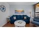 Cozy living room with stylish decor, comfortable seating, and a serene beach-themed painting on the wall at 208 74Th Ave. N # 2517, Myrtle Beach, SC 29572