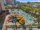 Aerial view of a vibrant waterpark featuring slides, lazy river, and Gathering-friendly amenities at 208 74Th Ave. N # 2517, Myrtle Beach, SC 29572