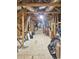 Unfinished attic space with exposed beams and visible insulation, ready for customization at 2300 Tansy Rd., Loris, SC 29569