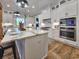 Modern kitchen with white cabinets, stainless steel appliances, and an island with a marble countertop at 2300 Tansy Rd., Loris, SC 29569