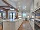Gourmet kitchen with a large island, stainless steel appliances, and custom cabinetry at 2300 Tansy Rd., Loris, SC 29569