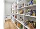 Walk-in pantry with floor-to-ceiling shelving, providing ample storage space at 2300 Tansy Rd., Loris, SC 29569