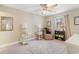 Bright bedroom featuring neutral walls, window with natural light, and comfortable seating at 2446 Farmwood Circle, Conway, SC 29527