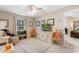 Cozy bedroom with a window, comfortable chair, and neutral décor at 2446 Farmwood Circle, Conway, SC 29527