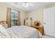 Inviting bedroom featuring window with natural light and a comfortable bed at 2446 Farmwood Circle, Conway, SC 29527