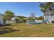 Spacious backyard features an above-ground pool, privacy fence, storage building, and mature landscaping at 2703 Canvasback Trail, Myrtle Beach, SC 29588