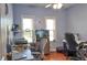 Bright office featuring two desks and chairs, next to two windows and an aquarium at 2703 Canvasback Trail, Myrtle Beach, SC 29588