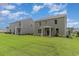 The backyard offers a covered patio, providing an ideal outdoor living space for dining or entertaining at 2892 Riverboat Way, Conway, SC 29526