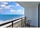 Enjoy breathtaking ocean views from this cozy balcony with seating and plenty of natural light at 3000 N Ocean Blvd. # 1020, Myrtle Beach, SC 29577