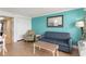 Comfortable living room including seating, a table, and easy access to the bedroom at 3000 N Ocean Blvd. # 1020, Myrtle Beach, SC 29577