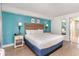 Well-lit bedroom with a king bed, wood headboard, and modern décor at 3000 N Ocean Blvd. # 1020, Myrtle Beach, SC 29577