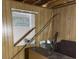 Bedroom showing incomplete repairs to the window, and damage to the ceiling and walls at 317 29Th Ave. N, North Myrtle Beach, SC 29582