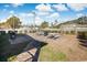 Spacious backyard featuring picnic tables, brick pavers, lush grass, and mature landscaping at 3170 Holmestown Rd., Myrtle Beach, SC 29588