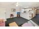Open-concept living room with TV, with partial wall to the kitchen at 3170 Holmestown Rd., Myrtle Beach, SC 29588