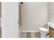 This bathroom has cream tiling, a bathtub with a shower and updated hardware at 3700 Golf Colony Lane # 5J, Little River, SC 29566