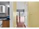 Spacious living area offers wood floors, spiral staircase, and access to an outdoor balcony at 3700 Golf Colony Lane # 5J, Little River, SC 29566