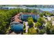 Stunning aerial view of the condo complex surrounded by lush greenery and waterfront views at 4601 Greenbriar Dr. # 201, Little River, SC 29566