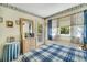 Bedroom with dresser, window, and balcony at 4601 Greenbriar Dr. # 201, Little River, SC 29566
