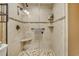Bathroom walk-in glass shower featuring mosaic tiling, and multiple shower heads at 4601 Greenbriar Dr. # 201, Little River, SC 29566