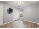 Bedroom with closet, ceiling fan and a window for natural light at 4648 Fringetree Dr. # C, Murrells Inlet, SC 29576