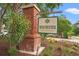 Welcoming Winchester community sign with lush landscaping and mature trees in a beautiful neighborhood at 4648 Fringetree Dr. # C, Murrells Inlet, SC 29576