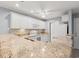 Kitchen with stone countertops, white cabinets, and stainless steel appliances at 4648 Fringetree Dr. # C, Murrells Inlet, SC 29576