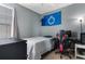 Cozy bedroom with a single bed and gaming area, ideal for relaxation and entertainment at 480 River Oaks Dr. # 63-O, Myrtle Beach, SC 29579