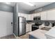 Modern kitchen featuring stainless steel appliances, ample counter space, and a welcoming atmosphere at 480 River Oaks Dr. # 63-O, Myrtle Beach, SC 29579