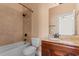 Bathroom featuring shower-tub combo with decorative tile, a toilet, and vanity at 482 Pomo Dr., Myrtle Beach, SC 29579