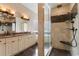 Luxurious bathroom features dual vanities, a glass shower, and a soaking tub for ultimate relaxation at 482 Pomo Dr., Myrtle Beach, SC 29579