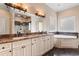 Elegant bathroom with dual sinks, granite countertop, a soaking tub and glass enclosed shower at 482 Pomo Dr., Myrtle Beach, SC 29579